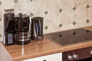 Coffee and tea making facilities at Apartment Oberbichl