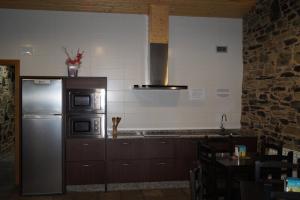 Kuchyňa alebo kuchynka v ubytovaní Albergue San Anton