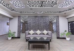 Posezení v ubytování Hamdan Plaza Hotel Salalah, an HTG Hotel