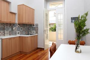 Kuchyň nebo kuchyňský kout v ubytování Poplar Mansion
