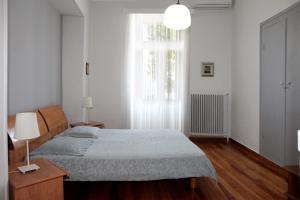 Postel nebo postele na pokoji v ubytování Poplar Mansion