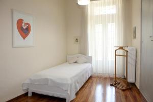 Postel nebo postele na pokoji v ubytování Poplar Mansion