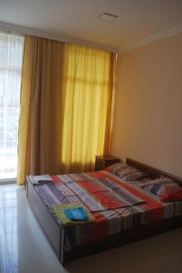 Postel nebo postele na pokoji v ubytování Guesthouse in Batumi
