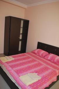 Postel nebo postele na pokoji v ubytování Guesthouse in Batumi