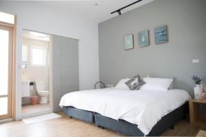 Postel nebo postele na pokoji v ubytování Foresweet B&B