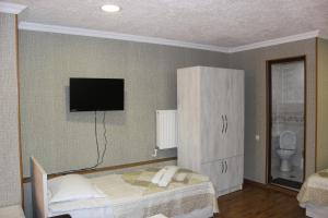 Letto o letti in una camera di Hotel Rabath