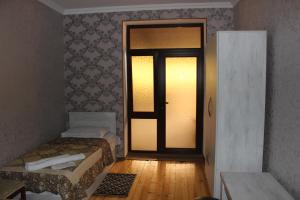 Letto o letti in una camera di Hotel Rabath