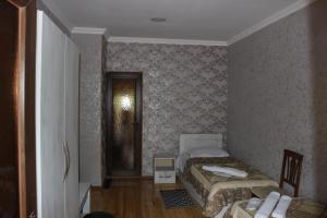Letto o letti in una camera di Hotel Rabath