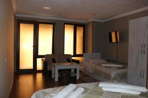 Letto o letti in una camera di Hotel Rabath