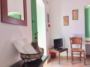 Ruang duduk di Villa Lemonia - Guest House