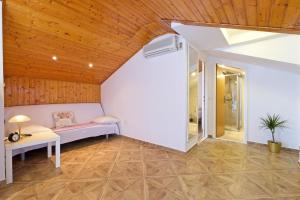 Cama o camas de una habitación en Apartments Klaić