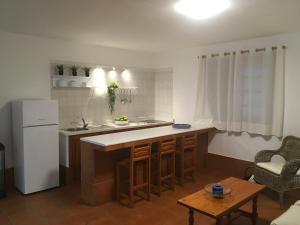 a kitchen with a sink and a counter top at Apartamento en el pueblo de Arrieta 4 in Arrieta