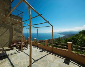 a balcony with a view of the ocean at B&B La Canonica - Svegliarsi a Verezzi in Borgio Verezzi