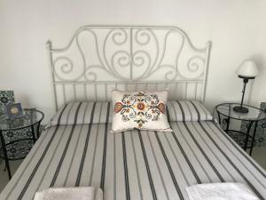 Postel nebo postele na pokoji v ubytování Casa Zancle