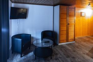 TV a/nebo společenská místnost v ubytování Hotel Restaurant Simplon