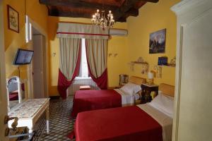A bed or beds in a room at Bed and Breakfast di Francia