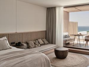 A bed or beds in a room at Olea All Suite Hotel, a Member of Design Hotels