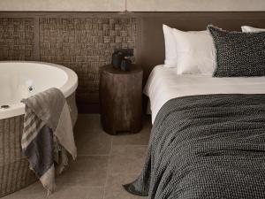 A bed or beds in a room at Olea All Suite Hotel, a Member of Design Hotels