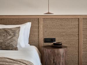 A bed or beds in a room at Olea All Suite Hotel, a Member of Design Hotels