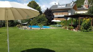 Vonkajšia záhrada v ubytovaní Garni Hotel Tauber