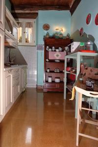 A kitchen or kitchenette at Bed and Breakfast di Francia