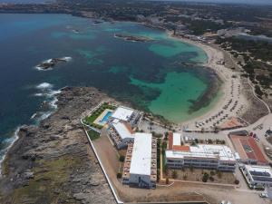 an aerial view of a beach and the ocean at Hotel Roca Bella in Es Pujols