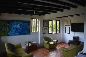 Photo de la galerie de l'établissement Hostal Pachamama, à San Agustín