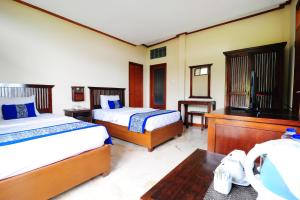 Letto o letti in una camera di Dago Highland Resort