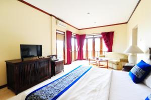 Letto o letti in una camera di Dago Highland Resort