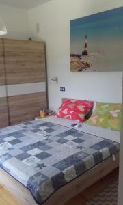 Postel nebo postele na pokoji v ubytování Apartman Pašman K.B.168