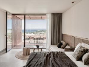 A seating area at Olea All Suite Hotel, a Member of Design Hotels