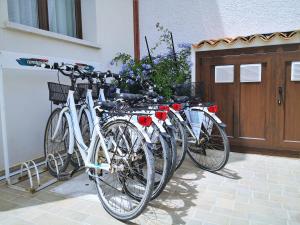 a row of bikes parked next to a building at Hotel Perla Gaia in San Vito lo Capo