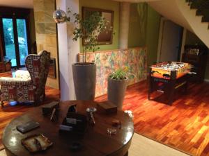 a living room with a coffee table and a table sidx sidx sidx at El Refugio. in Teruel