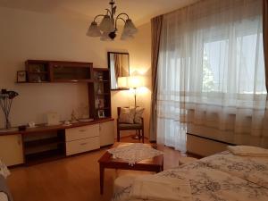 Posteľ alebo postele v izbe v ubytovaní Apartman Iskra