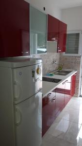 Kuchyň nebo kuchyňský kout v ubytování Apartments Babić