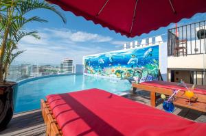 a swimming pool on the roof of a building at Nhat Minh Hotel and Apartment in Danang