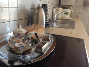 a tray of food on a counter in a kitchen at Apartments Villa Laura in Pula