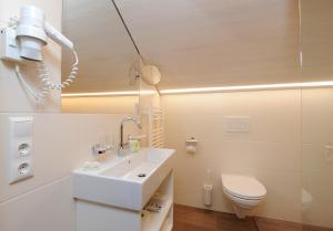 Koupelna v ubytování BOUTIQUEHOTEL das edelweiss
