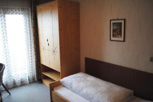 Łóżko lub łóżka w pokoju w obiekcie Pension Lachmayr