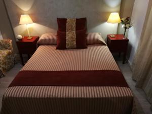 Postel nebo postele na pokoji v ubytování Hostal Maestre