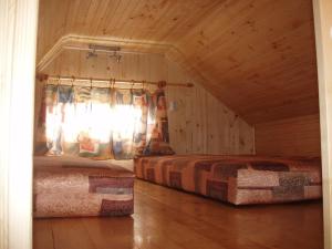 Un pat sau paturi într-o cameră la Chaty Dagmar