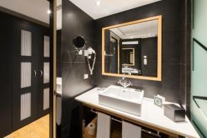 Ein Badezimmer in der Unterkunft Hotel Jazz