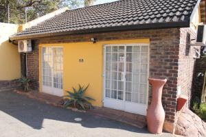 Galerija fotografija objekta Flintstones Guest House Fourways u gradu 'Johannesburg'