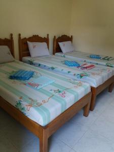 Кровать или кровати в номере Eco Pension