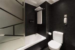 Ein Badezimmer in der Unterkunft Hotel Jazz