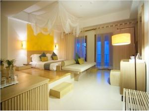 Mercure Koh Chang Hideaway客房内的一张或多张床位