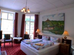 Cama ou camas em um quarto em Union Hotel Cochem