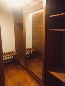 
a room with a wooden floor and a wooden door at El Vino Hotel & Suites in Bodrum City
