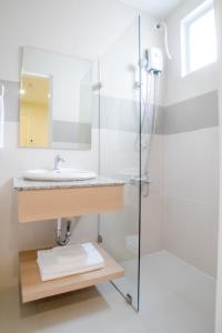 Ein Badezimmer in der Unterkunft Bridge Hotel