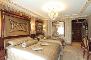 Postel nebo postele na pokoji v ubytování Ottoman's Life Hotel S Class